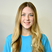 Smiling headshot for Leaps & Bounds Coach Jaidyn LeViere
